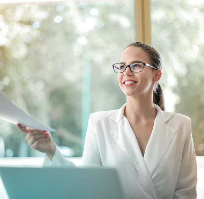 Compliance professional reviewing documentation